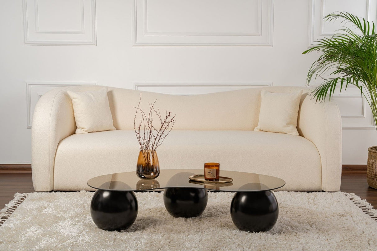 Organische salontafel brons getint glas zwarte bolpoten Sphere 120x70 cm