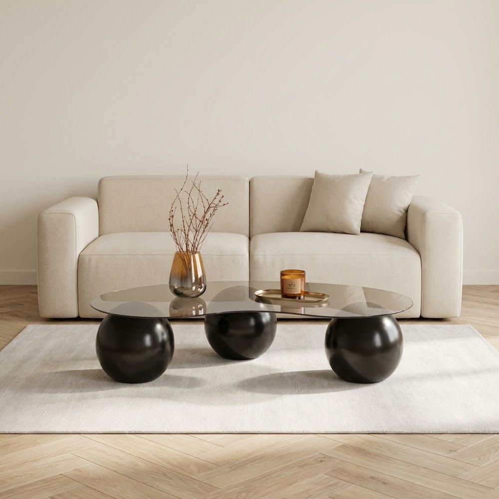 Organische salontafel brons getint glas zwarte bolpoten Sphere 120x70 cm