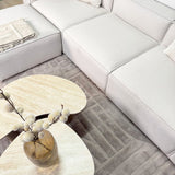 Modulaire hoekbank met losse hocker ecru beige linnen stof Fora - links